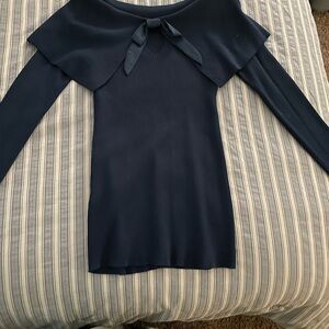 Worn once, off the shoulder sweater with bow in back. Turquoise, size small